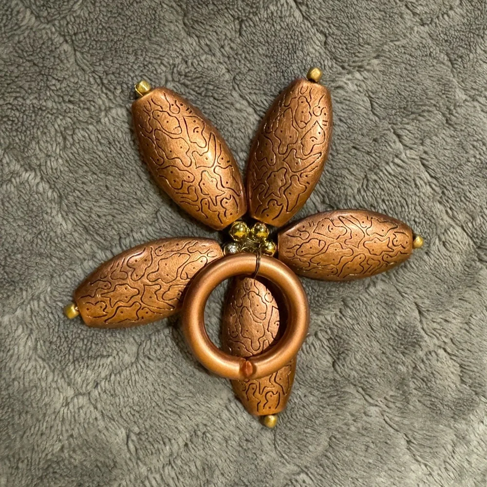 Bulk of Bronze Flower Napkin Rings Set